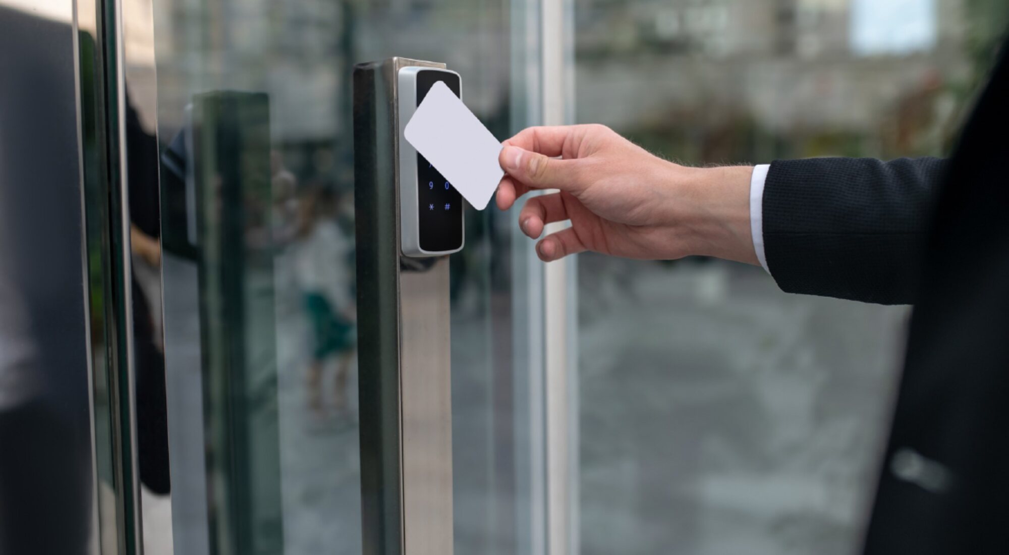 Card presented to a reader on a glass entrance door