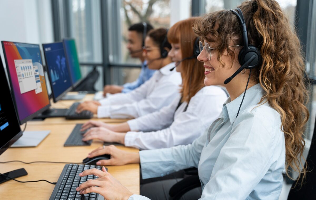 Call centre agents on headsets