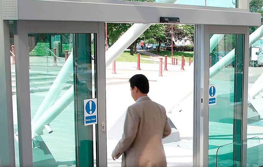 Automatic sliding entrance doors