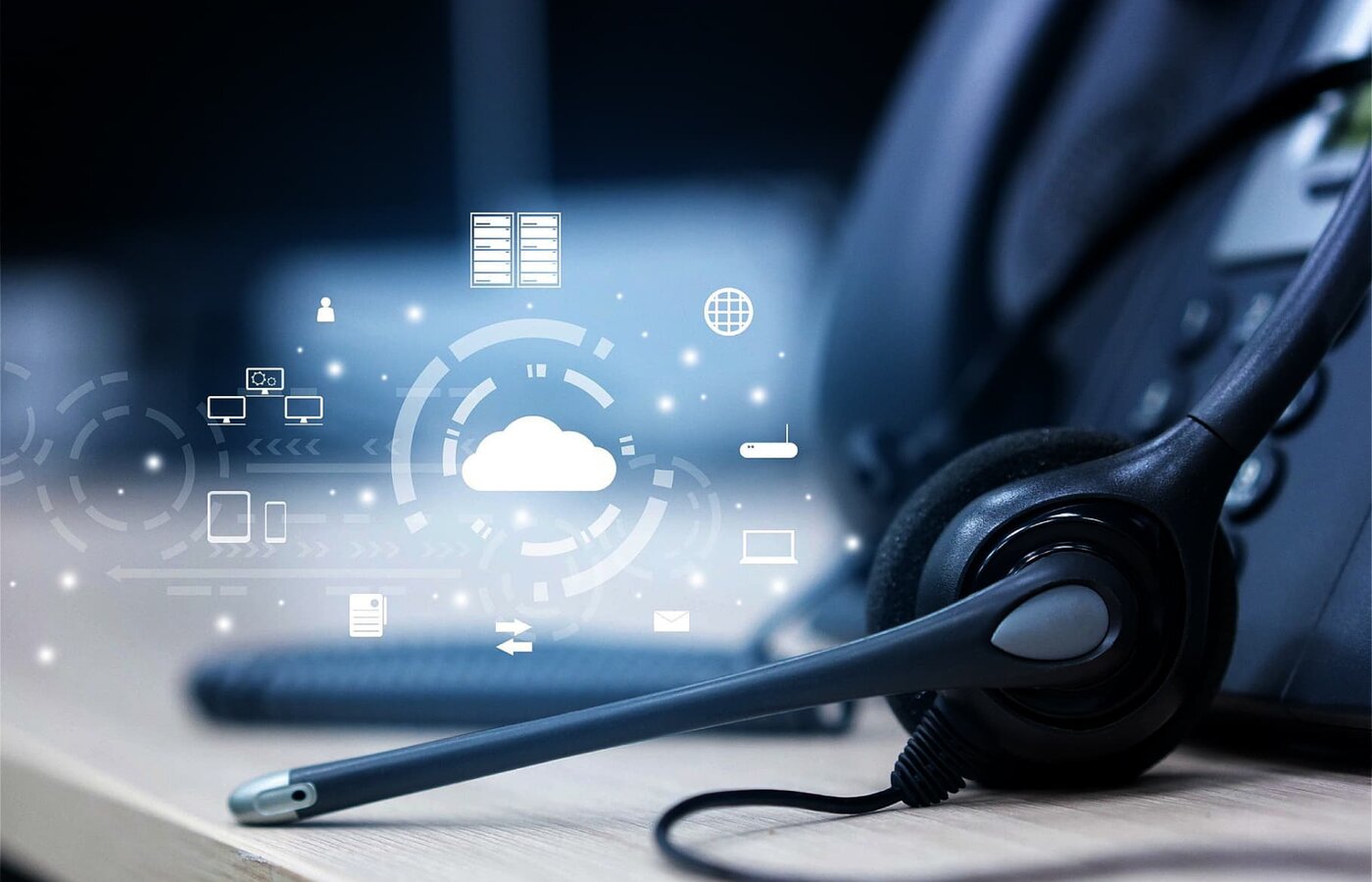 Headset beside a screen ready for calls